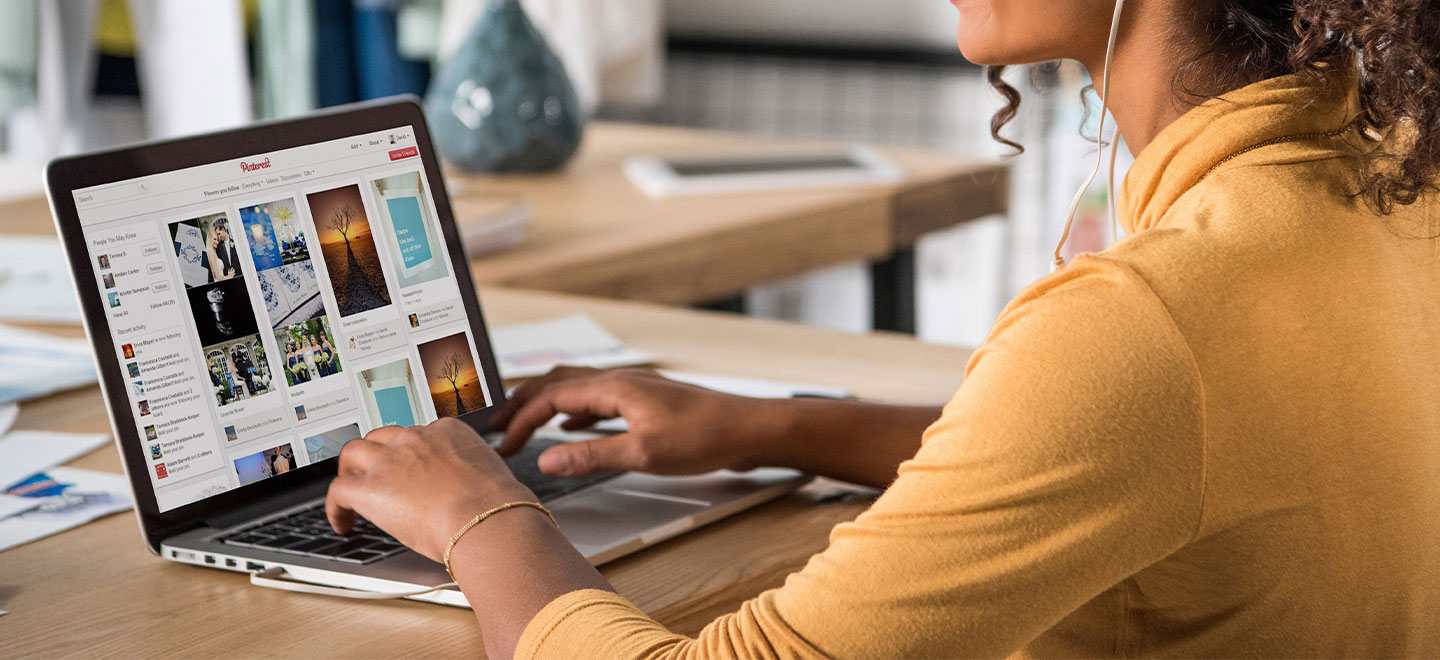 Women sitting at desk on laptop